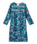 A long-sleeve teal nightgown with a colorful floral print in pink, purple, and green, featuring a ruffled neckline with white trim.