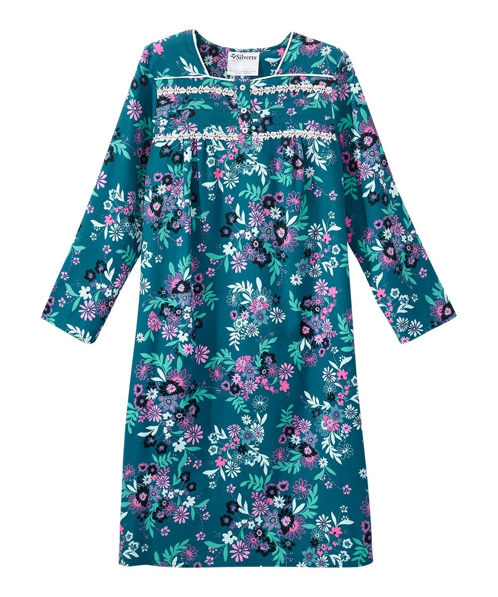 A long-sleeve teal nightgown with a colorful floral print in pink, purple, and green, featuring a ruffled neckline with white trim.