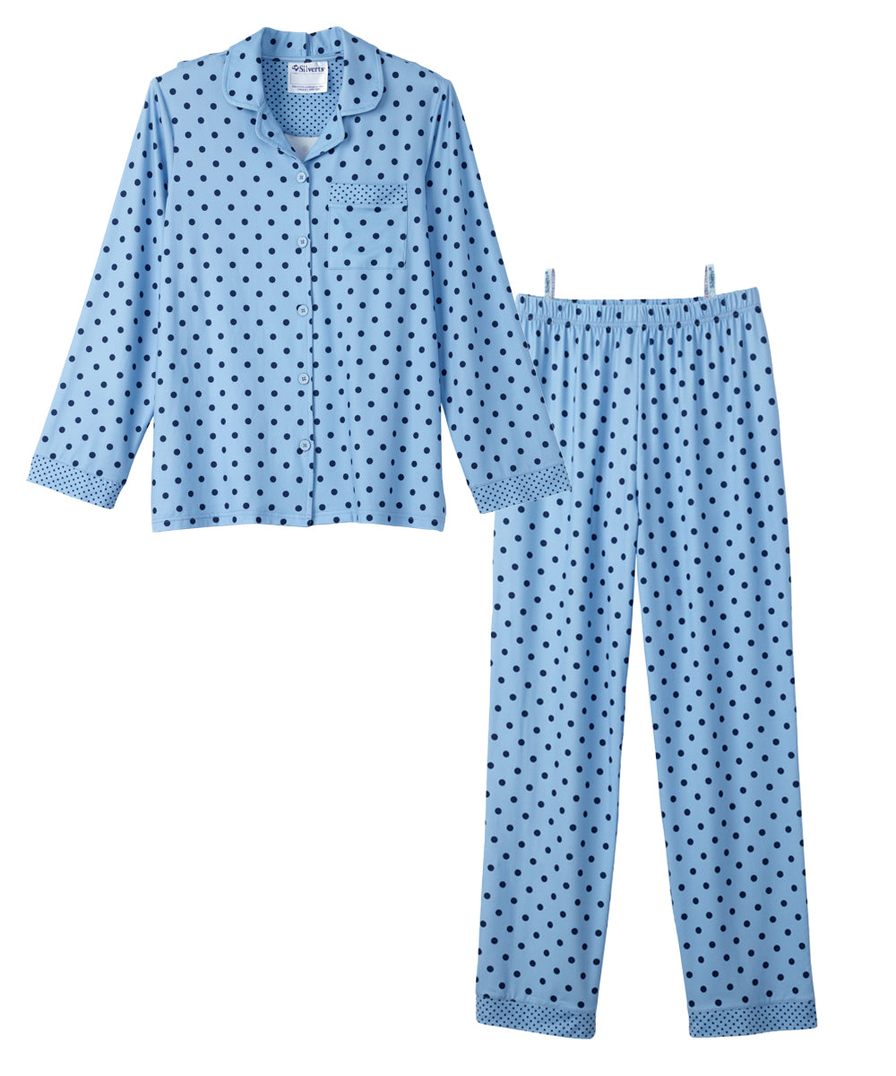 A two-piece children's pajama set in light blue with a dark blue polka dot pattern, including a long-sleeve button-up shirt and matching pants, shown on a plain white background.