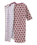 Two patterned cloths with diamond designs on a white background